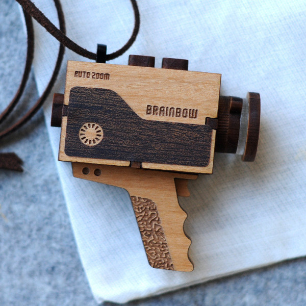 Cool wooden necklaces: Super 8 video camera necklace on Cool Mom Tech