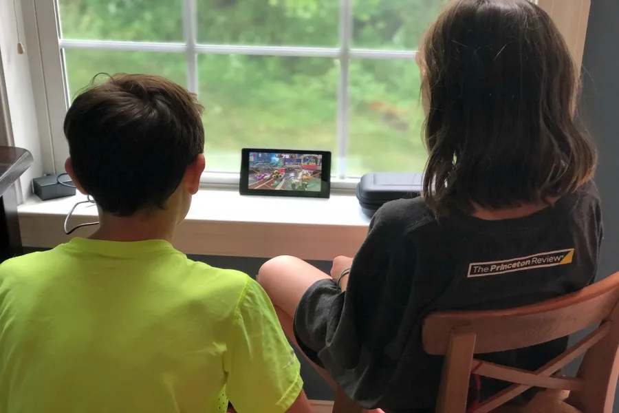 How video gaming can help your kids get along better