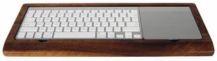 Ambidextrous keyboard tray. AKA paper clip keeper. AKA candy keeper.