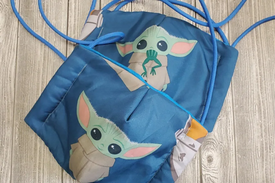 Small but powerful: Baby Yoda face masks for the win