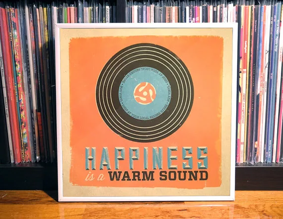 Happiness is music on vinyl. Which either makes you really cool or really old.