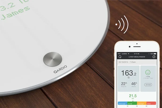 The Qardio Base smart scale keeps track of your health data on its app, and just smiles at you when you register your weight.