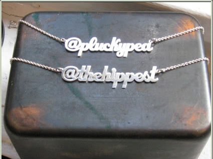 Twitter handle necklaces = Status symbols for the uber geek. Oh yeah.