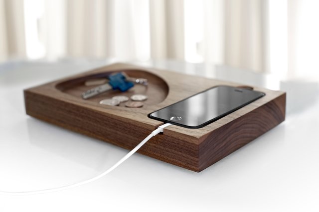 A handmade wooden iPhone docking station to keep your pockets empty and your desktop pretty