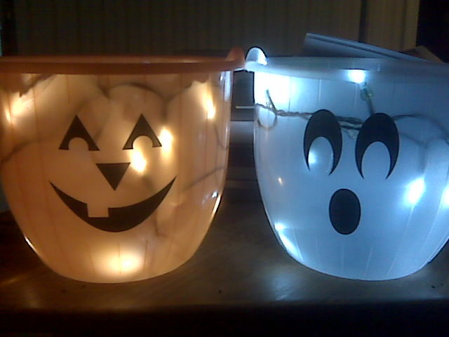 A DIY light up Halloween bucket: Because you need both hands free to scoop up all that candy.