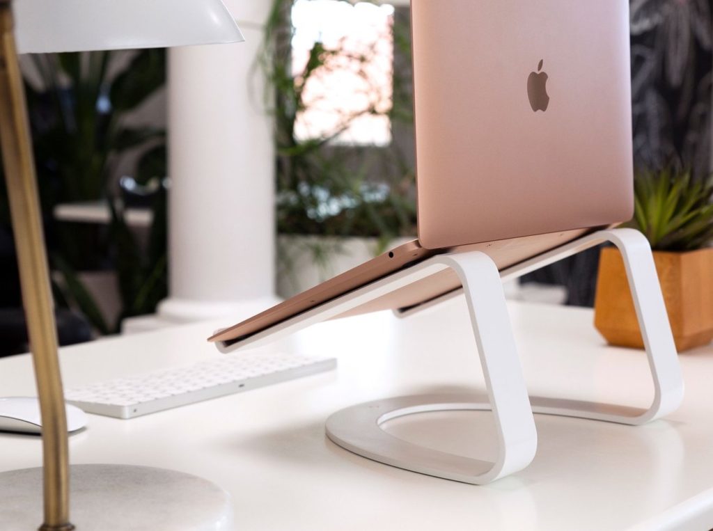 Ergonomic laptop accessories for work or study: The Curve laptop stand elevates your MacBook to a perfect 6.5 inches above your desk so it's at eye level